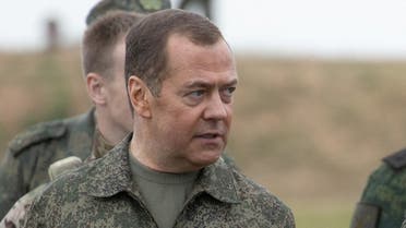 FILE PHOTO: Russia's Deputy head of the Security Council Dmitry Medvedev, accompanied by Deputy Defence Minister Nikolay Pankov, visits the Prudboi military training ground in Volgograd region, Russia June 1, 2023. Sputnik/Yekaterina Shtukina/Pool via REUTERS ATTENTION EDITORS - THIS IMAGE WAS PROVIDED BY A THIRD PARTY./File Photo