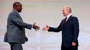 President of the Central African Republic Faustin-Archange Тouadera, left, and Russian President Vladimir Putin shake hands before an official ceremony to welcome the leaders of delegations to the Russia Africa Summit in St. Petersburg, Russia, Thursday, July 27, 2023. (Sergei Bobylev/TASS Host Photo Agency Pool Photo via AP)