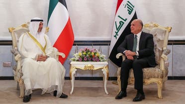 Iraq’s Foreign Minister Fuad Hussein (R) meets his Kuwaiti counterpart Sheikh Salem Abdullah al-Jaber al-Sabah in Baghdad on July 30, 2023. (Photo by Ahmad AL-RUBAYE / AFP)