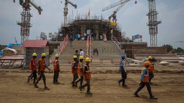 Workers walk in front of the under construction Hindu Ram Temple in Ayodhya in India, July 9, 2023. (File photo: Reuters)