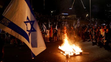 Protesters block Ayalon Highway during a demonstration following a parliament vote on a contested bill that limits Supreme Court powers to void some government decisions, in Tel Aviv, Israel July 24, 2023. (Reuters)
