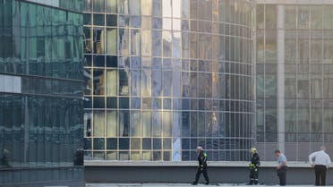 Emergency personnel work near a damaged office building in the Moscow City following a reported Ukrainian drone attack in Moscow Russia, on August 1, 2023. (Reuters)