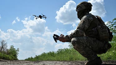 A Ukrainian serviceman of 108th separate territorial defence brigade of the Armed Forces of Ukraine launches a drone near a frontline, amid Russia's attack on Ukraine, in Zaporizhzhia region, Ukraine August 4, 2023. (Reuters)