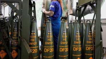 An employee works at a production line of 155 mm artillery shells at the plant of German company Rheinmetall, which produces weapons and ammunition for tanks and artillery, during a media tour in Unterluess, Germany, June 6, 2023. (File photo: Reuters)