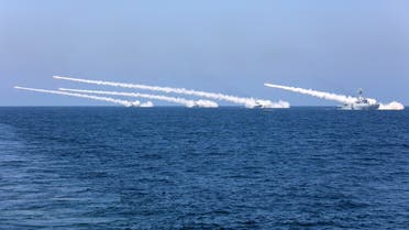 Chinese naval warships fire missiles during a live-fire military drill in the waters of Bohai Sea and Yellow Sea, off China's east coast, August 7, 2017. Picture taken August 7, 2017. REUTERS/Stringer ATTENTION EDITORS - THIS PICTURE WAS PROVIDED BY A THIRD PARTY. CHINA OUT.