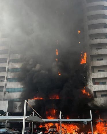 A residential building in Ajman on fire. (Facebook)