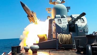 This grab taken from a handout footage released by the Russian Defense Ministry on July 21, 2023 shows a Russian Black Sea Fleet warship firing a cruise missile during drills in the Black Sea. (AFP)