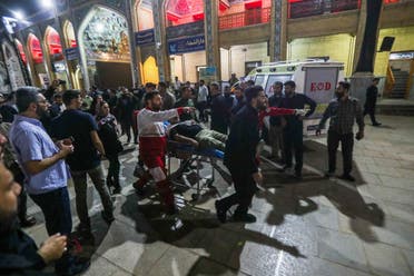 Emergency personnel transport the injured following a shooting attack at Iran's Shah Cheragh mausoleum in the Fars province capital Shiraz, on August 13, 2023. (AFP)