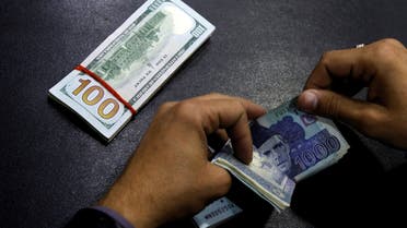 rupee dollar [Reuters]