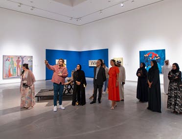 Curator Dr Omar Kholeif leading exhibition tour of In the Heart of Another Country, Al Mureijah Art Spaces, Sharjah, 2023. (Image courtesy of Sharjah Art Foundation. Photo: Shanavas Jamaluddin)