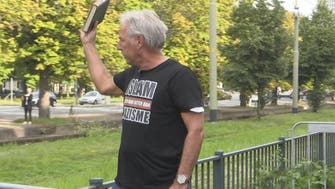 Far-right activist ripped up Quran at demonstration in Netherlands