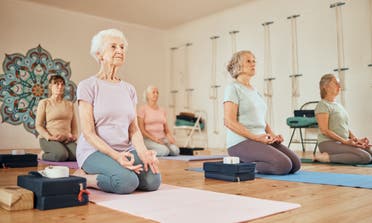 Women take part in a meditation class. (Stock image)