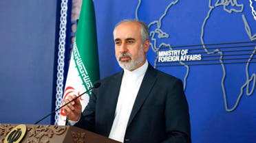In this photo released on Thursday, Aug. 11, 2022, by the Iranian Foreign Ministry, Foreign Ministry spokesperson Nasser Kanaani speaks in Tehran, Iran. Kanaani denied on Monday, Aug. 15, 2022, that Tehran was involved in the assault on author Salman Rushdie, in remarks that were the country's first public comments on the attack. (Iranian Foreign Ministry via AP)