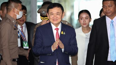 Former Thai Prime Minister Thaksin Shinawatra, who is expected to be arrested upon his return as he ends almost two decades of self-imposed exile, walks at Don Mueang airport in Bangkok, Thailand August 22, 2023. (Reuters)