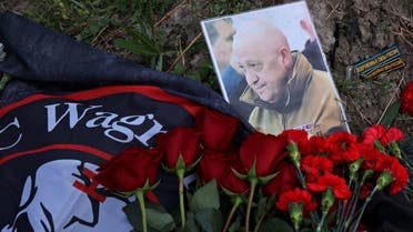 A view shows a portrait of Wagner mercenary chief Yevgeny Prigozhin at a makeshift memorial near former PMC Wagner Centre in Saint Petersburg, Russia August 24, 2023. (Reuters)