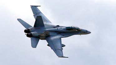 In this April 12, 2013, file photo, a U.S. Marine F/A-18 Hornet jet flies low pass during Philippines-US joint military exercise in northern Philippines - (AP Photo/Bullit Marquez)