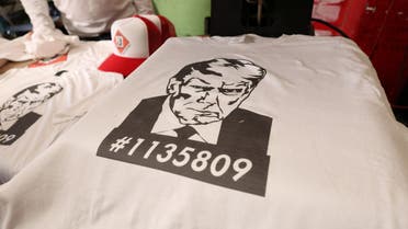 Trump supporters critics make merchandise out of historic mugshot