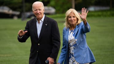 US President Joe Biden and First Lady Jill Biden walk to the White House upon arrival on the South Lawn in Washington, DC, August 26, 2023, following a week-long vacation in Lake Tahoe, Nevada. (AFP)
