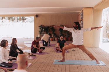 People take part in a yoga class in AlUla, Saudi Arabia. (Supplied)