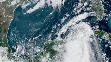 Tropical Storm Idalia makes its way to Cuba and Florida's west coast in a composite image from the National Oceanic and Atmospheric Administration (NOAA) GOES-East weather satellite August 28, 2023. (Reuters)