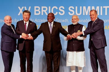President of Brazil Luiz Inacio Lula da Silva, President of China Xi Jinping, South African President Cyril Ramaphosa, Prime Minister of India Narendra Modi and Russia's Foreign Minister Sergei Lavrov pose for a BRICS family photo during the 2023 BRICS Summit at the Sandton Convention Centre in Johannesburg, South Africa, on August 23, 2023. (Reuters)