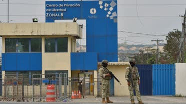 Members of Ecuadorean Armed Forces stand guard outside the Zonal prison number 8 after the transfer of the criminal leader Jose Adolfo Macias Villamar, known as Fito,from the prison, in Guayaquil, Ecuador August 14, 2023. (Reuters)