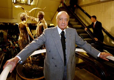 Harrods chairman Mohamed Al-Fayed unveils a memorial to his son Dodi and Britain’s Diana, Princess of Wales, at Harrods in London on September 1, 2005. (Reuters)