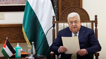 Palestinian leader Mahmoud Abbas reads a statement during a meeting with US Secretary of State Antony Blinken (not seen) in Ramallah in the Israeli-occupied West Bank, January 31, 2023. (Pool via Reuters)