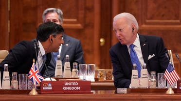 British Prime Minister Rishi Sunak talks with US President Joe Biden during the first session of the G20 Summit, in New Delhi, India, on September 9, 2023. (Reuters)