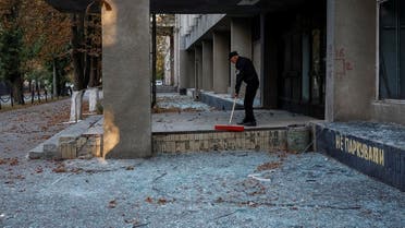 A staff cleans up broken windows of a building damaged during a Russian drone strike, amid Russia’s attack on Ukraine, in Kyiv, Ukraine, September 10, 2023. (Reuters)