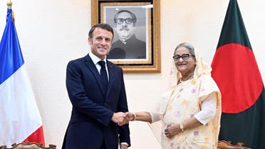 French President Emmanuel Macron meets Sheikh Hasina, Prime Minister of Bangladesh at her office in Dhaka, Bangladesh, September 11, 2023. (Reuters)