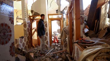 Mouath Aytnasr, 20, who lost his 7-year-old brother Suleiman in the earthquake, walks on the rubble of his damaged house, in a hamlet on the outskirts of Talat N'Yaaqoub, in the aftermath of Morocco's deadliest earthquake September 11, 2023. (Reuters)