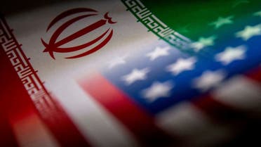 The Iranian and US flags are seen printed on paper in this illustration taken January 27, 2022. (Reuters)