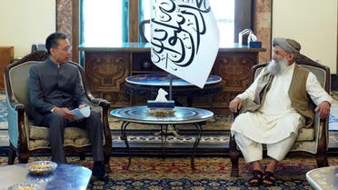 In this handout photo released by the Taliban Prime Minister Media Office, China's new ambassador to Afghanistan Zhao Sheng meets with Taliban Prime Minister Mohammad Hasan Akhund during the recognition ceremony at the Presidential Palace in Kabul, Afghanistan, Wednesday, Sept. 13, 2023. The Taliban on Wednesday greeted China's new ambassador to Afghanistan with pomp and ceremony, calling the envoy's nomination a significant step with a significant message. (Taliban Prime Minister Media Office via AP)
