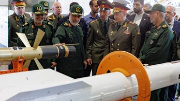 Russia’s Defense Minister Sergei Shoigu listens to Iran’s IRGC Aerospace Force Commander Amirali Hajizadeh as they visit an Iranian aerospace industry’s exhibition in Tehran, Iran, September 20, 2023. (Russian Defense Ministry via Reuters)