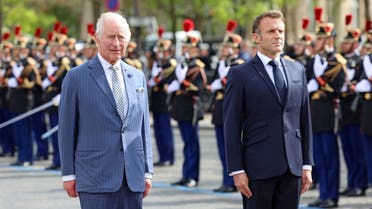 King Charles III and President of France, Emmanuel Macron are pictured during a ceremonial welcome at The Arc De Triomphe on September 20, 2023 in Paris, France. (Reuters)