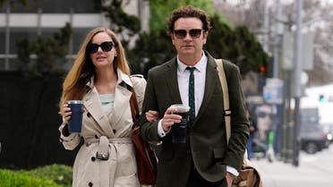 Danny Masterson, right, and his wife Bijou Phillips arrive for closing arguments in his second rape trial, May 16, 2023, in Los Angeles.  (AP)