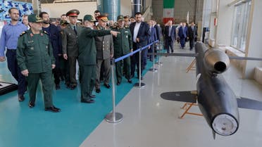 Russia’s Defense Minister Sergei Shoigu listens to Iran’s IRGC Aerospace Force Commander Amirali Hajizadeh as they visit an Iranian aerospace industry’s exhibition in Tehran, Iran, September 20, 2023. (Russian Defense Ministry via Reuters)