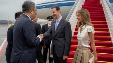 Syria's President Bashar al-Assad and his wife Asma are welcomed upon their arrival at Hangzhou airport, China in this handout picture obtained by Reuters on September 21, 2023. (Reuters)