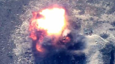 This grab taken from a handout footage released by the Azerbaijani Defence Ministry on September 19, 2023 show an explosion, that Baku claims to be Azerbaijani forces destroying positions used by Armenians in the Nagorno-Karabakh region. (AFP PHOTO / AZERBAIJANI DEFENCE MINISTRY / HANDOUT)