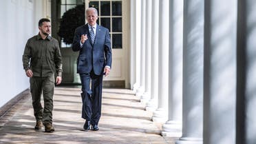 US President Joe Biden and Ukrainian President Volodymyr Zelenskiy walk through the colonnade to the Oval Office at the White House in Washington, DC, on September 21, 2023. JIM WATSON/Pool via REUTERS