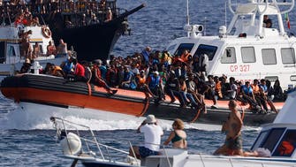 EU agrees new rules on hosting migrants, seeks to cut numbers