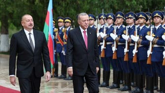Azerbaijan leader vows to guarantee rights of Karabakh Armenians as Erdogan visits