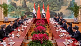 China says will promote development of new partnership with Syria