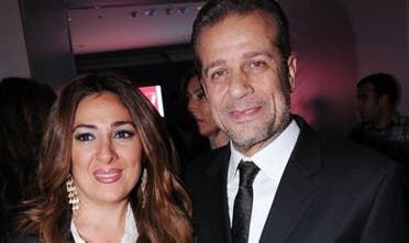 شريف منير وزوجته لورا عماد