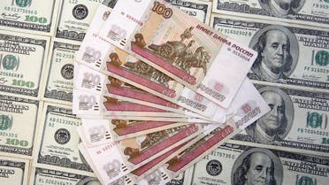 A picture illustration shows U.S. Dollar and Russian Ruble banknotes in Sarajevo, March 9, 2015. REUTERS/Dado Ruvic (BOSNIA AND HERZEGOVINA - Tags: BUSINESS)