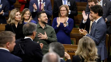 Ukraine’s President Volodymyr Zelenskyy is applauded by Canadian Prime Minister Justin Trudeau following his speech at the House of Commons on Parliament Hill in Ottawa, Ontario, Canada, on September 22, 2023. (Reuters)