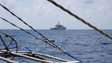 A China Coast Guard ship is seen from a Philippine fishing boat at the disputed Scarborough Shoal April 6, 2017. (Reuters)