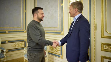 Ukraine’s President Volodymyr Zelenskyy welcomes British Defense Secretary Grant Shapps before a meeting, amid Russia’s attack on Ukraine, in Kyiv, Ukraine, in this handout picture released on September 28, 2023. (Reuters)
