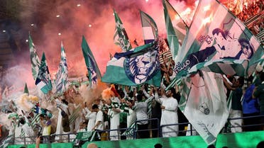  Al Ahli fans with flags and flares. (File photo: Reuters)